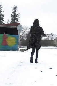 Engaging Black Haired Gal Pisses Out In The Snow