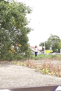 Exotic Brunette Cynthia Vellons Taking A Leek Outside