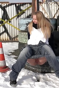Violette Squats In The Snow To Piss Outdoors