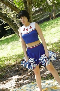 Take A Look At This Excited Cheerleader As She Undressed In The Public And Rubs Her Clit In This Porn
