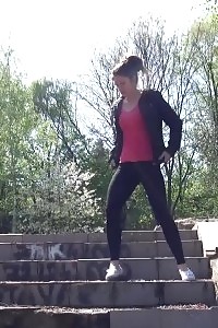Black-haired Doll Pisses Down Some Concrete Steps