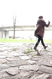 Intriguing Dame In High Heels Pisses Outside In The City