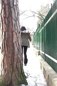 Captivating Black Haired Chick Pisses On The Snow