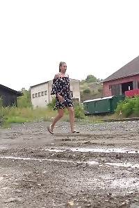 Beautiful Black-haired Yenna Squats And Pissing In A Puddle