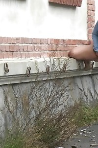 Naughty Brunette Lifts Up Her Dress To Pee