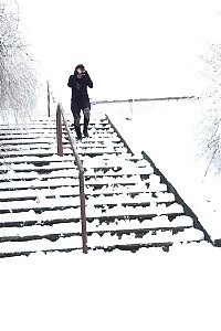 Black Haired European Relieves Herself In Public