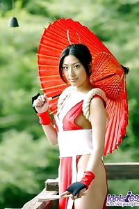 Wild Asian Girl Spreads Her Attractive Body In Her Peek A Boo Gown
