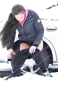 Beautiful Brunette Relieves Pee Desperation In Snow