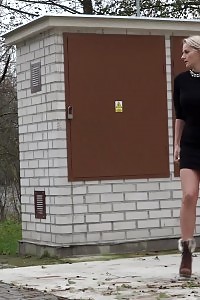 Staggering Blonde Squats To Pee Outside